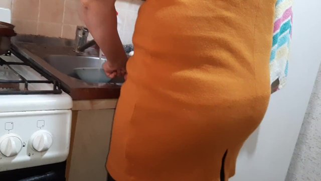 While our housekeeper is washing the dishes, we are engaged in mutual masturbation in the kitchen