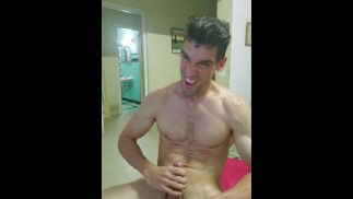 Fitness enthusiast guy makes crazy faces while enjoying and reaching orgasm