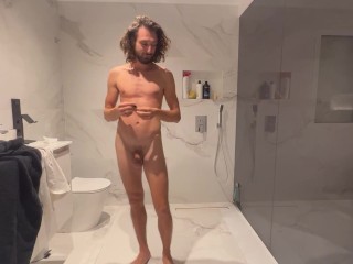 Man's Cold Shower Routine in the Bathroom and his Reaction