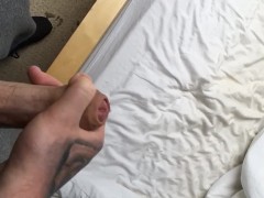 Wanking at work and squirting cum over the clients bed