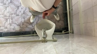 How guys pee in a urinal?