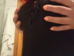 In a loose dress with lace, no bra