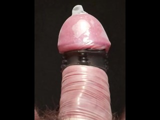 Vibrating Penis in Condom in Slow Motion