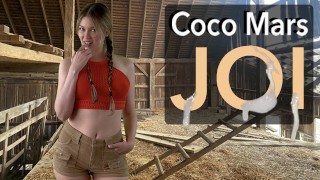 Coco Mars gives you a handjob in a barn