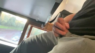 Boss plays with his cock under the desk