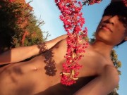 Preview 1 of In a pink orchard, gay twink shows his cock, plays with dick, lubes penis, jerks off, cums outdoors