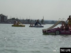 Sexy brunette exhibitionist masturbates in public at the lake