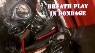 Breathing While Wearing A Rubber Bondage And Acting Strange In A Gas Mask