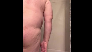 Chubby dad takes shower with massager