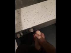 Rock hard barista edges behind counter and in bathroom while no one's around