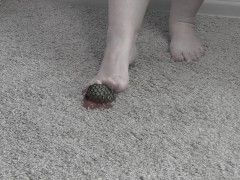 She crushed the ball with her bare feet. Tapping fetish.