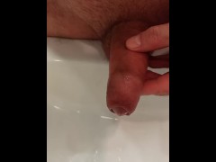I pee in the sink with a dick that just leaked cum.