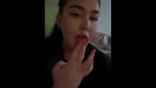 She loves to suck fingers and then caress her pussy
