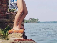 Exhibitionist girl peeing standing in public rest zone almost caught by the police