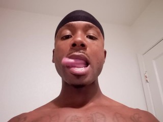 Showing off long tongue (Fetish).