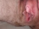 Pissing with a close up view of pussy and clit