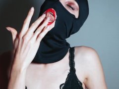 pussy in a balaclava with a rough tongue licks herself