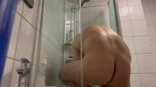 Taking a shower.