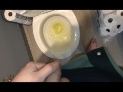 Guy from NASA takes a leak