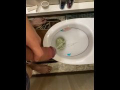 Pissing from a big beautiful uncut dick in two streams