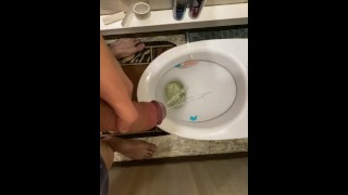 Pissing from a big beautiful uncut dick in two streams