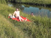 Preview 2 of Nudist beach. Public nudity. Naked in public. Sexy MILF without panties and bra sunbathes naked Nude