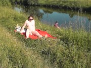 Preview 4 of Nudist beach. Public nudity. Naked in public. Sexy MILF without panties and bra sunbathes naked Nude