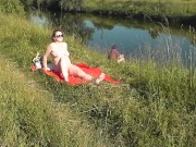 Preview 5 of Nudist beach. Public nudity. Naked in public. Sexy MILF without panties and bra sunbathes naked Nude