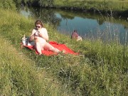 Preview 6 of Nudist beach. Public nudity. Naked in public. Sexy MILF without panties and bra sunbathes naked Nude