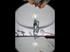 Messy pissing into the sink