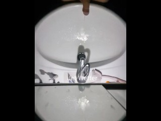 Messy Pissing into the Sink