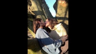 Hot couple kissing in public