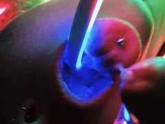 Her illuminated throat receives sperm