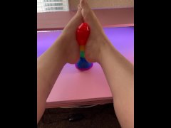 Giving my favorite rainbow cock a teasing footjob