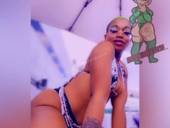 Trini chilling pool side