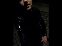 Walking around in rubber and wanking