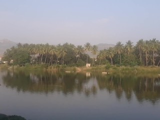 I'm at the Puttaparthi River, India.