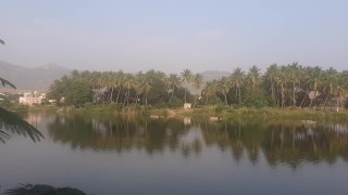 I'm at the Puttaparthi River, India.