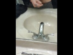 Solo big dick busts big load in sink
