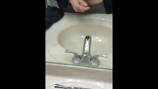 Solo big dick busts big load in sink