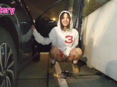 Crazy college girl pees in the parking lot of the store