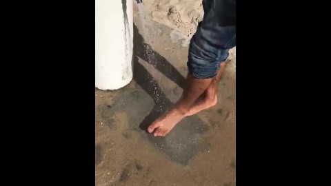 Beach Feet, washing sand off