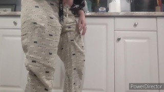 Desperate Wife Soaks Her Pants While Doing The Dishes