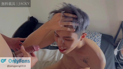 Asian cute boy gets cum all over his face