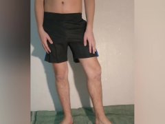 A guy shows what a chastity belt looks like under his clothes - a chastity cage in shorts