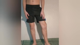 A guy shows what a chastity belt looks like under his clothes - a chastity cage in shorts