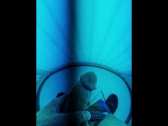 Jerking off in the tanning booth. Hard cock