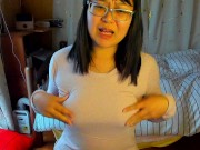 Preview 3 of A busty Japanese woman feels good by caressing her nipples through her innerwear.