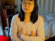 Preview 5 of A girl with glasses masturbates her nipples through her innerwear.