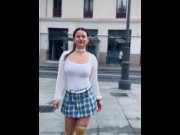 Preview 5 of Braless brunette in a miniskirt walking the city streets.